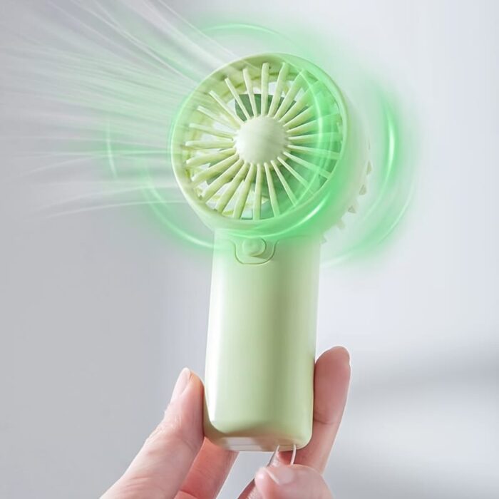 8d7752b6-f4d9-4986-bbe3-934c20e585a6.jpg Battery Operated Mini Portable Fan, Lightweight Handheld Fan - Ideal for Office, Outdoor, Traveling and Camping - Stay Cool Anytime, Anywhere! (Requires AAA batteries, not included)