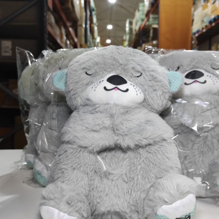 Peluche relajante para bebé que simula respiracion ( nutria gris )
