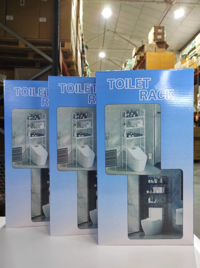 Estanteria de almacenamiento de metal sobre el inodoro