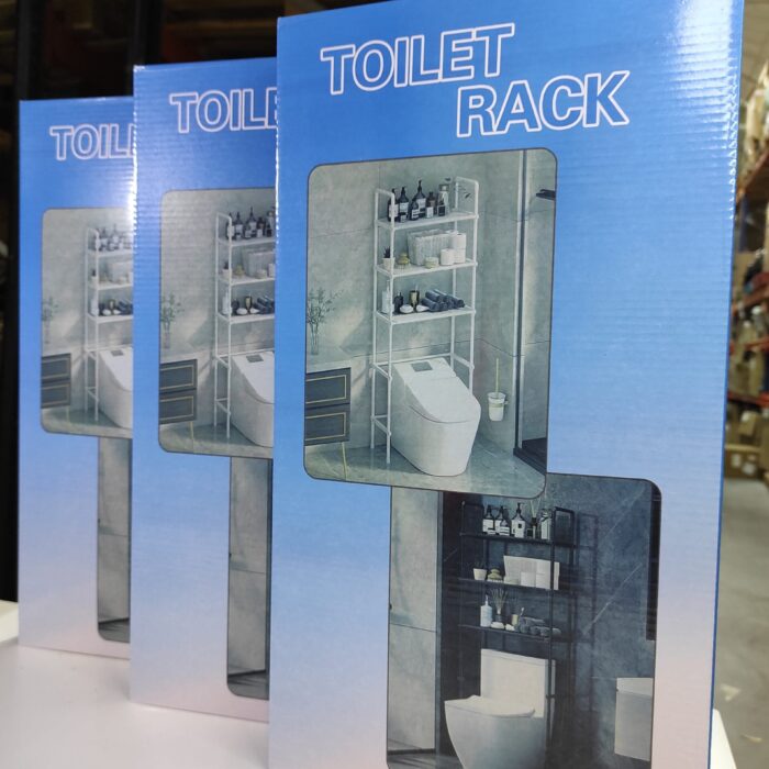 Estanteria de almacenamiento de metal sobre el inodoro