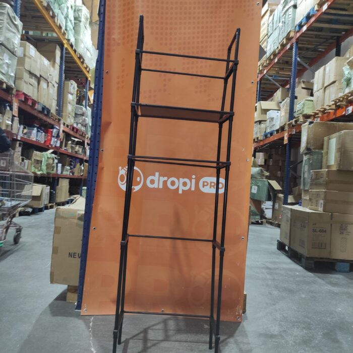 Estanteria de almacenamiento de metal sobre el inodoro