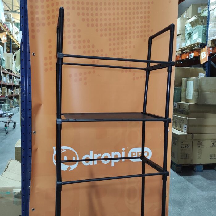 Estanteria de almacenamiento de metal sobre el inodoro