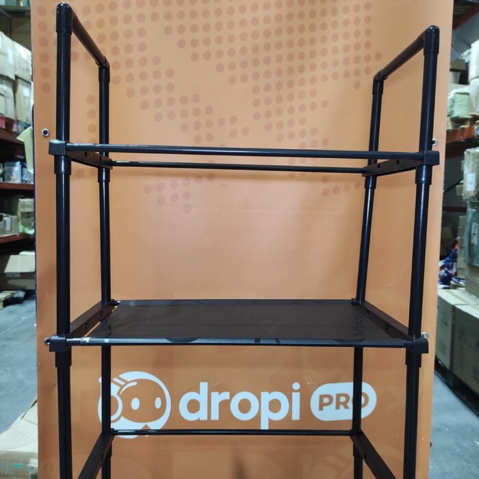 Estanteria de almacenamiento de metal sobre el inodoro